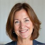 Professional headshot of Elara Vance, a warm, approachable woman in her late 40s, with a gentle smile and intelligent eyes.