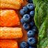 Close-up of colorful anti-inflammatory foods like turmeric and berries